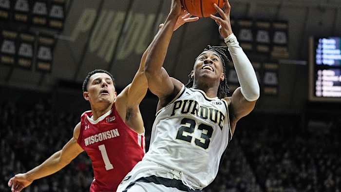 Purdue's Jaden Ivey shoots past Wisconsin's Johnny Davis